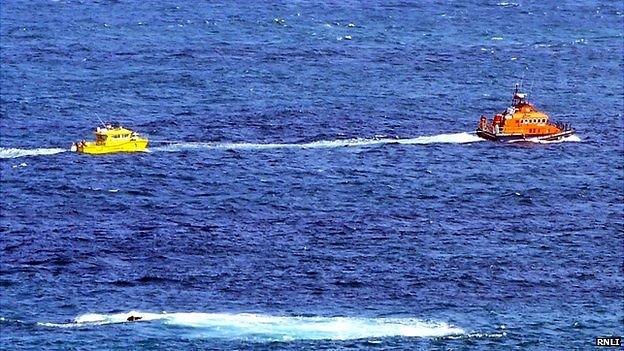 Alderney lifeboat towing Bumblebee ferry