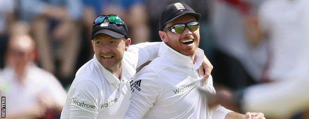 Adam Lyth celebrates a catch with Ian Bell