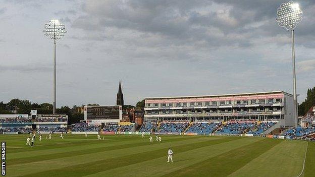 The rare site of cricketers in whites under lights at Headingley