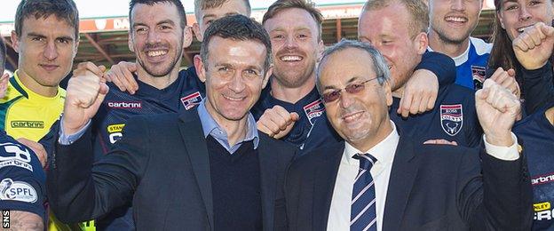 Jim McIntyre and Ross County chairman Roy McGregor celebrate