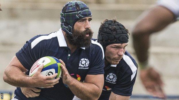 Josh Strauss carries the ball for Scotland against Fiji in June 2017