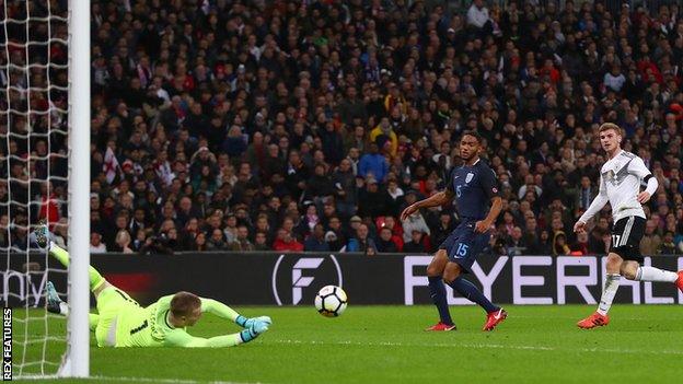 Jordan Pickford makes a save from Germany striker Timo Warner