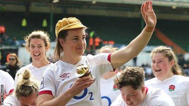 Emily Scarratt with a golden cap