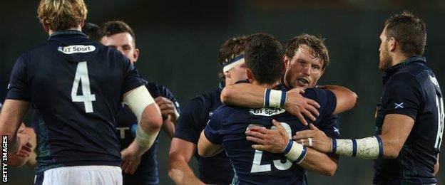 Scotland's Peter Horne celebrates with Damien Hoyland in Turin