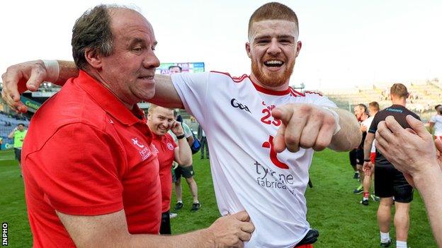 Feargal Logan congratulates Cathal McShane after Tyrone's surprise semi-final win over Kerry