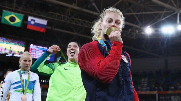 Kayla Harrison kisses her gold medal