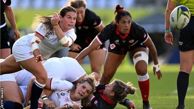 Leanne Infante passes the ball