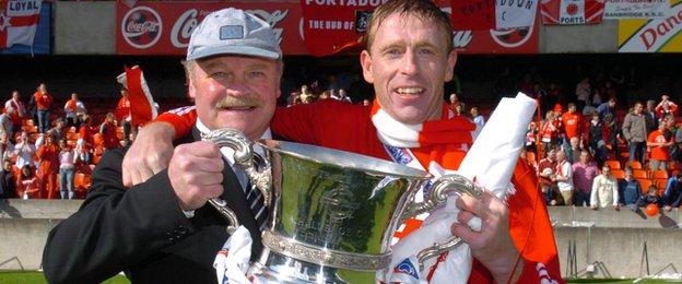 Ronnie McFall celebrates winning the 2005 Irish Cup with Portadown striker Vinny Arkins