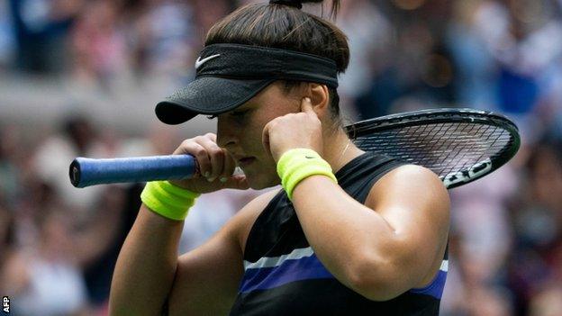 Bianca Andreescu puts her fingers in her ears