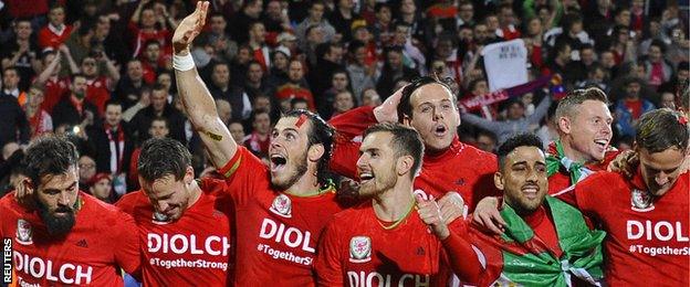 Wales players celebrate at the end of a historic Euro 2016 qualifying campaign