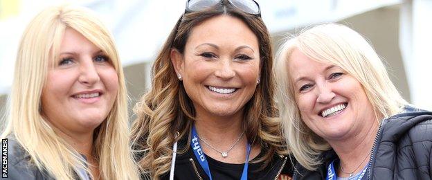 Becky with Faye Ho, the partner of Michael Rutter, and Jill McWilliams, the wife of Jeremy McWilliams, at Thursday's North West 200 practice session