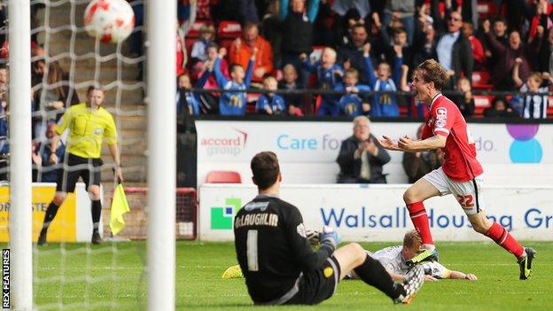 Liam Kinsella scores past Jon McLaughlin