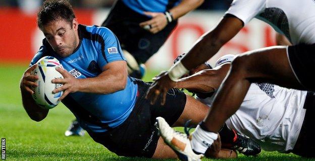 Uruguay's Carlos Arboleya scores against Fiji