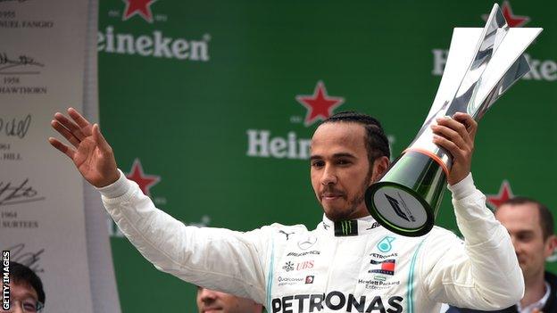 Lewis Hamilton celebrates winning the Chinese Grand Prix in 2019