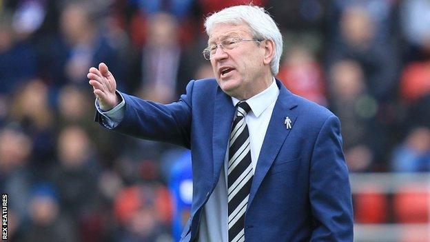 Chris Kinnear on the sidelines managing Dover Athletic