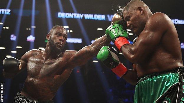 Deontay Wilder hits Luis Ortiz with a left jab