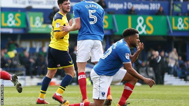 Nathan Thompson goes to ground after Alex Mowatt shoves him