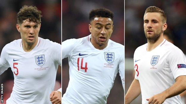 John Stones (left), Jesse Lingard (centre) and Luke Shaw