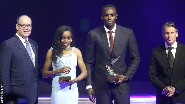 Usain Bolt (centre right) with Almaz Ayana (centre left)