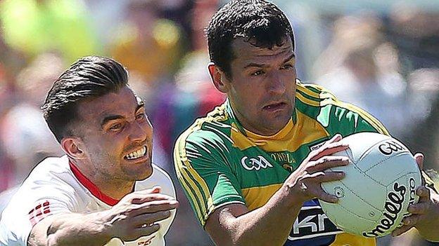 Tyrone's Tiernan McCann and Frank McGlynn of Donegal in action during the 2016 Ulster final