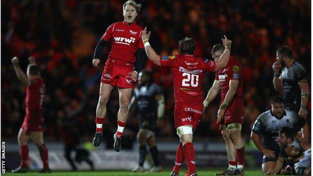 Scarlets' Aled Davies jumps for joy after beating Toulon