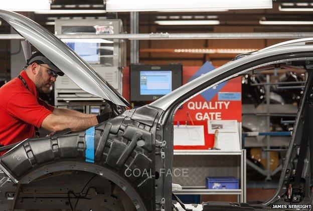 Nissan worker on production line