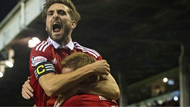 Graeme Shinnie and Adam Rooney