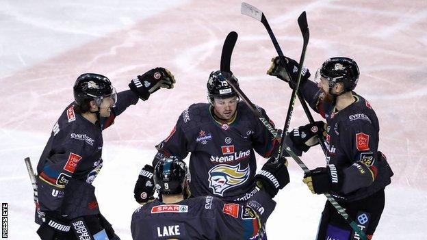 Darcy Murphy receives the congratulations of team-mates after putting Belfast 3-1 ayead