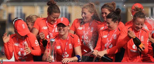 England with the T20 tri-series trophy