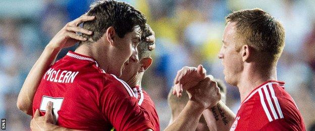 Kenny McLean fired an away goal for the Dons