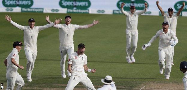 England celebrate a wicket