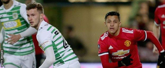 Tom James (left) in action for Yeovil Town