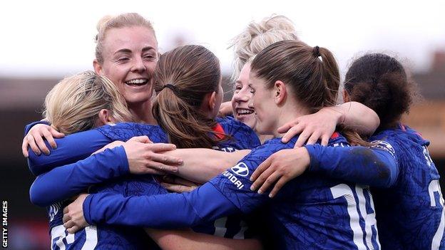 Sophie Ingle celebrates with Chelsea teammates