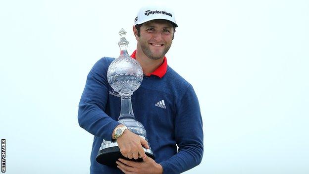 Jon Rahm of Spain poses with the trophy after his victory during the final round of the Irish Open