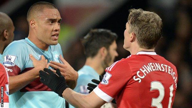 Manchester United midfielder Bastian Schweinsteiger (right) clashed with West Ham defender Winston Reid