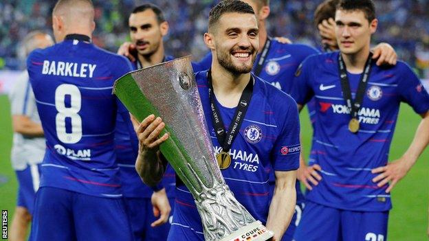 Mateo Kovacic with the Europa League trophy