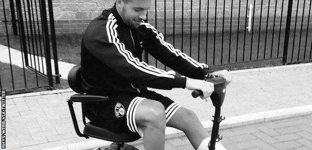 Rhys Webb takes his grandmother's mobility scooter for a spin