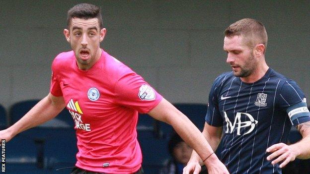 Joe Gormley (left) in action for Peterborough