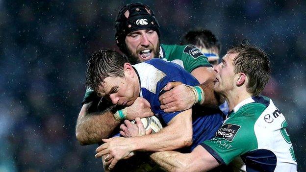 Connacht duo John Muldoon and Kieran Marmion tackle Leinster's Eoin Reddan