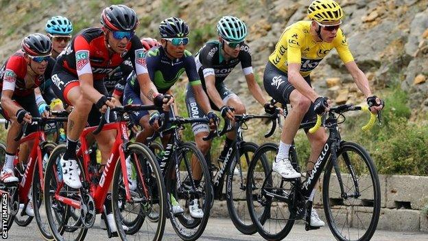 Chris Froome (right) riding on stage eight of the Tour de France