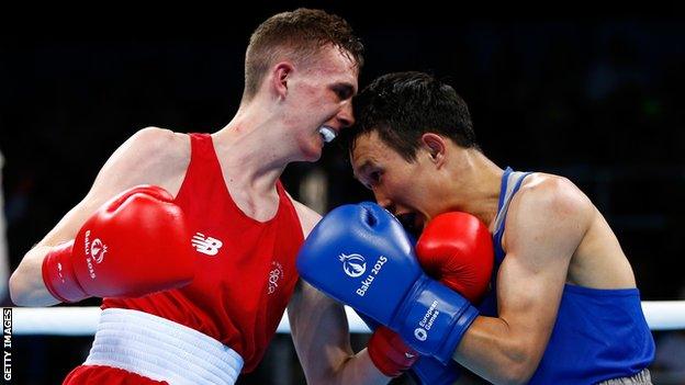 Brendan Irvine in action against Bator Sagaluev in the light-flyweight final