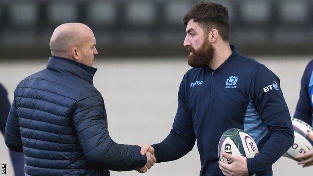 Gary Graham shakes hands with Gregor Townsend