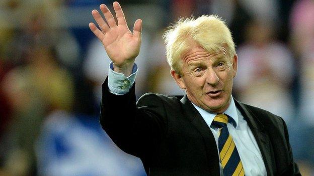 Scotland manager Gordon Strachan waves to fans in Portugal