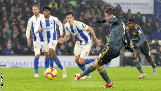 Jamie Vardy scores a penalty in Leicester's 1-1 draw at Brighton.