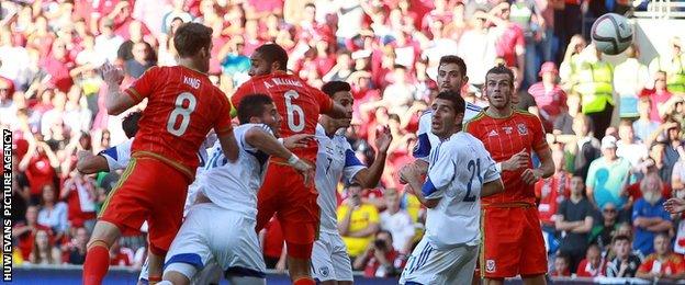 Andy King goes close with a header against Israel