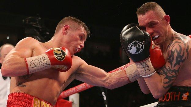 Ryan Burnett lands a left on Jason Booth in Saturday's British title fight in Manchester