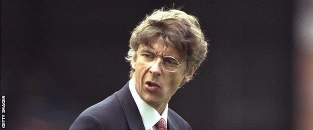 Arsene Wenger on the touchline as Arsenal manager in 1996