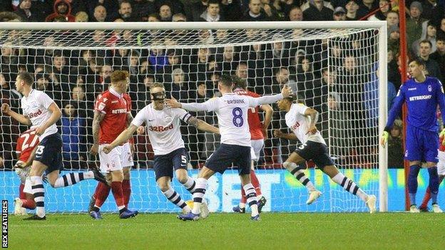 Preston players celebrate Lewis Moult's goal