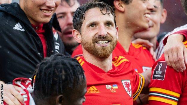 Joe Allen celebrates after Wales beat Ukraine to end the nation's 64-year wait to qualify for the World Cup