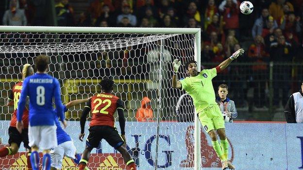 Gianluigi Buffon is beaten by a lob from Belgium's Kevin de Bruyne